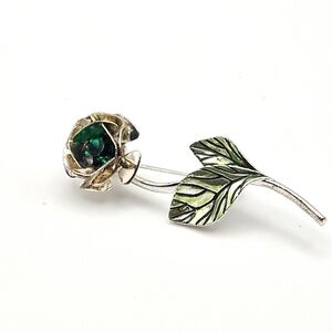 Vintage Avon SH silver May birthstone rose pin with green crystal gem signed